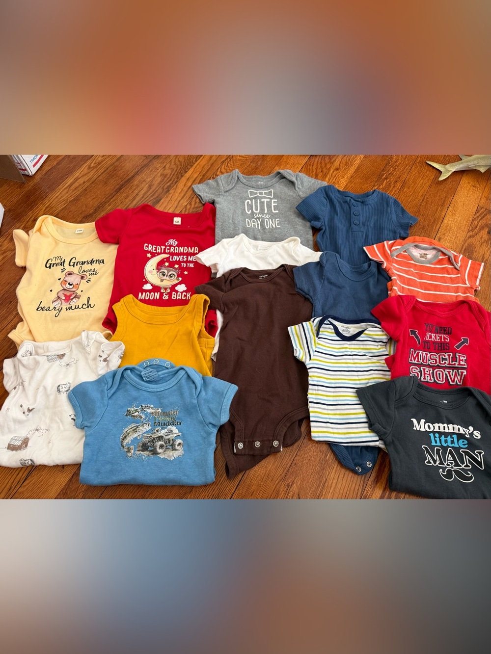 Assorted Kids Short-Sleeve onesies.